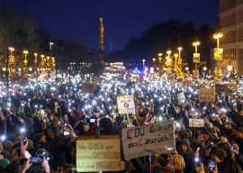 mass protests erupt in berlin over immigration plan