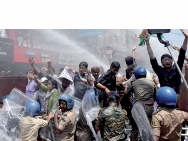students gesture as police use water cannons to disperse them in patna photo reuters students gesture as police use water cannons to disperse them in patna photo reuters
