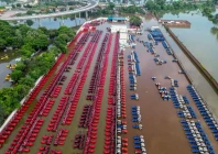 an aerial view shows tractors partially submerged in floodwaters at a dealership stockyard following a rise in the water level of the punpun river in patna on sep 7 2026 file photo afp