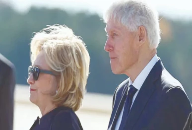former us president bill clinton and former us secretary of state hillary clinton arrive at dobbins air reserve base marietta georgia photo reuters file