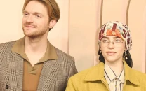 finneas backs billie eilish over uno restock criticism