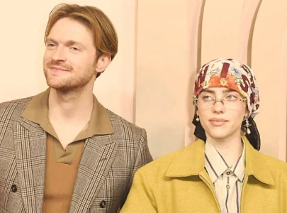finneas backs billie eilish over uno restock criticism