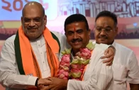 india s home minister amit shah l greets bharatiya janata party bjp leader and newly selected chief minister of west bengal suvendu adhikari c during a party meeting in kolkata on may 8 2026 photo afp