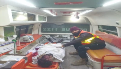 the body of a suicide blast victim is being taken to a hospital photo express