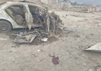 the wreckage of a vehicle used in the bombing lies at the attack site in miranshah in north waziristan district photo express