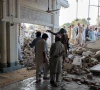 people gather at a damaged mosque following a blast at a police facility in kohat on september 18 2026 photo reuters