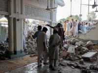 people gather at a damaged mosque following a blast at a police facility in kohat on september 18 2026 photo reuters