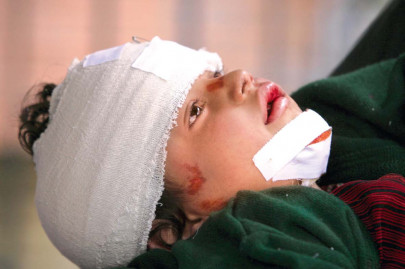 nowshera bombing fear and grief envelope lady reading hospital