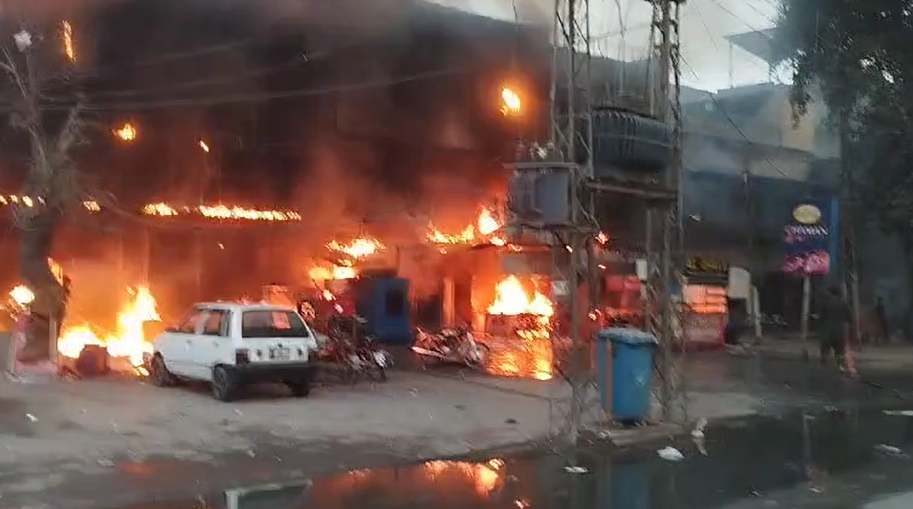 a screen grab of the video when a couple of shops caught fire due to cylinder blast photo express news