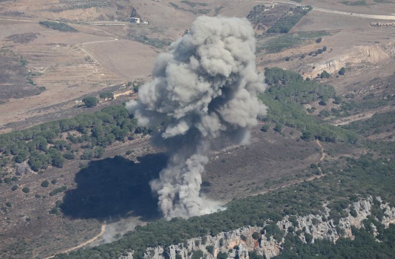 smoke billows over southern lebanon amid ongoing cross border hostilities between hezbollah and israeli forces as pictured from marjayoun near the border with israel september 24 2024 photo reuters