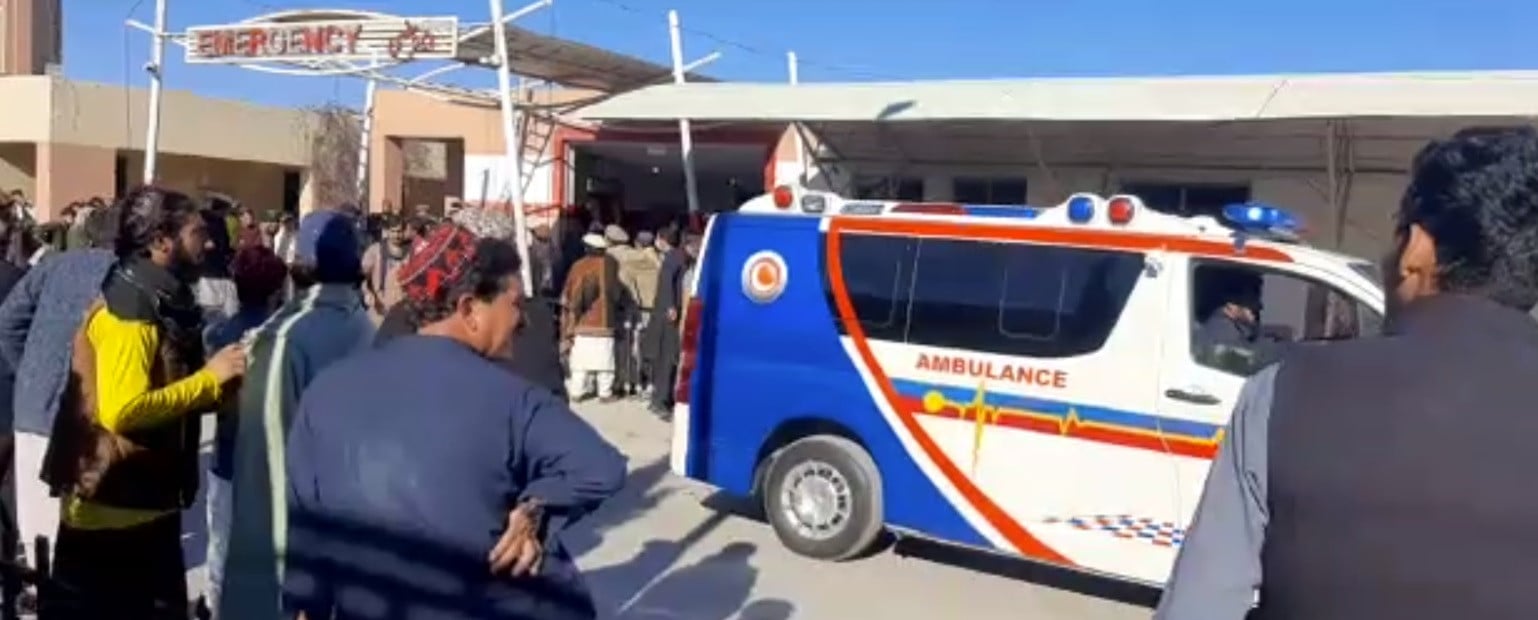 people stand outside dhq hospital emergency as victims are brought in photo file