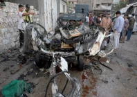 civilian impact palestinians inspect the site of an israeli strike on a vehicle in gaza city photo reuters civilian impact palestinians inspect the site of an israeli strike on a vehicle in gaza city photo reuters