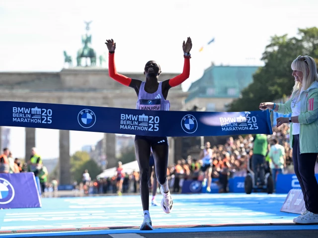 berlin s senator for sport iris spranger r reacts as kenya s rosemary wanjiru l wins the 51st edition of the berlin marathon photo afp