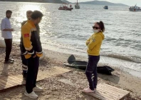 health workers stand next to a body bag as members of the coast guard command conduct a search and rescue operation after a migrant boat sank off the coast of bodrum in western mugla province turkey october 24 2025 photo reuters health workers stand next to a body bag as members of the coast guard command conduct a search and rescue operation after a migrant boat sank off the coast of bodrum in western mugla province turkey october 24 2025 photo reuters