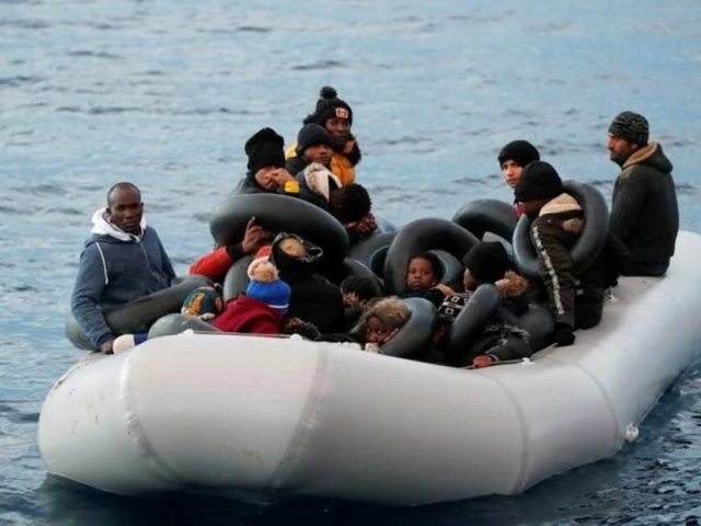 migrants are seen on a dinghy following a failed attempt to cross to the greek island of lesbos as a turkish coast guard boat aproaches them on the waters of the north aegean sea off the shores of canakkale turkey march 6 2020 photo reuters migrants are seen on a dinghy following a failed attempt to cross to the greek island of lesbos as a turkish coast guard boat aproaches them on the waters of the north aegean sea off the shores of canakkale turkey march 6 2020 photo reuters