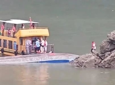 three dead 60 hospitalised as tourist boats capsize in china three dead 60 hospitalised as tourist boats capsize in china