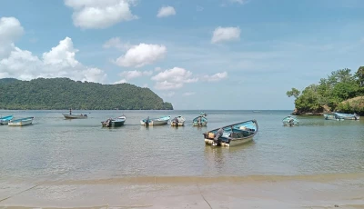 boats are pictured on the shore of la cueva bay north coast of trinidad and tobago on october 16 2025 us president donald trump said he had authorized covert action against the south american nation amid a military campaign targeting what washington says are drug traffickers in the caribbean and pacific photo afp