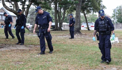 the police search for evidence around the area where the bondi beach shooting took place in sydney on december 16 2025 australia s leaders have agreed to toughen gun laws after attackers killed 15 people at a jewish festival on bondi beach the worst mass shooting in decades decried as antisemitic terrorism by authorities photo afp