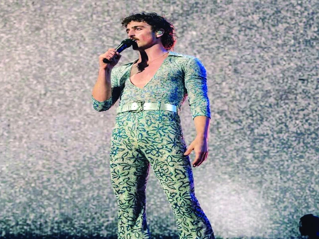 boone wore a custom dolce gabbana printed lurex bodysuit at coachella photo instagram boone wore a custom dolce gabbana printed lurex bodysuit at coachella photo instagram