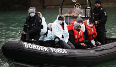 migrants arrive at the port of dover on board a border force vessel after being rescued while crossing the english channel in dover britain dec 17 2021 photo reuters