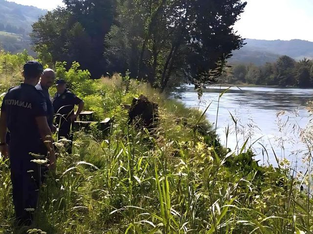 this handout photograph made available by the ministry of interior of serbia shows serbian police officers searching a bank of the drina river after a boat carrying 30 migrants sank photo afp this handout photograph made available by the ministry of interior of serbia shows serbian police officers searching a bank of the drina river after a boat carrying 30 migrants sank photo afp