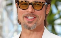 when is brad pitt s isle of man movie filming and why was he spotted at the legendary tt race