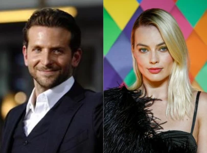 ocean s eleven prequel with bradley cooper and margot robbie heads into production