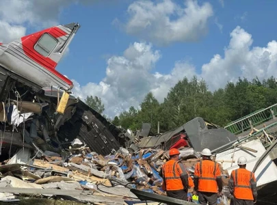 explosions collapse two bridges in russia killing seven as passenger train derails
