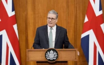 starmer opposes us tariffs on allies warns of downward spiral over greenland threats