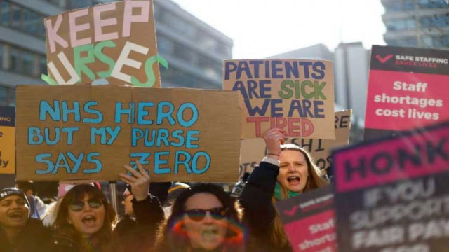 british workers stage largest strike in history of health service