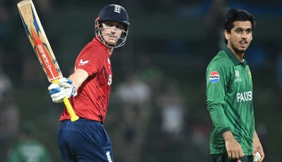 england captain harry brook l celebrates his half century 50 runs as pakistan s saim ayub r looks on during the 2026 icc men s t20 cricket world cup super eights match between england and pakistan at the pallekele international cricket stadium in kandy on february 24 2026 photo afp