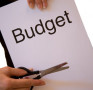 k p businessmen term budget burdensome