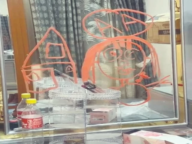 markings drawn with a lipstick on a dressing table left by thieves have left the household members and the police puzzled photo express