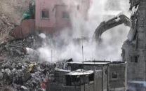 israel begins demolishing buildings in west bank camp