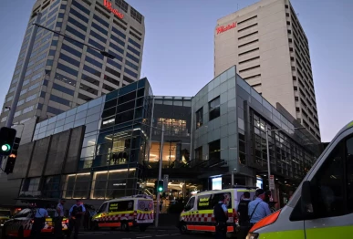 emergency service workers stand near bondi junction after multiple people were stabbed inside the westfield bondi junction shopping centre in sydney april 13 2024 photo reuters