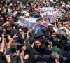 mourners carry the coffin of late iranian president ebrahim raisi during his burial ceremony in mashhad iran may 23 2024 photo reuters