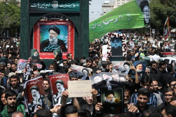 Iranian mourners attend the funeral of late president Ebrahim Raisi in the city of Mashhad on May 23, 2024. PHOTO: AFP
