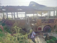 the wreckage of a school bus destroyed in bomb blast in khuzdar lies on a roadside photo ppi the wreckage of a school bus destroyed in bomb blast in khuzdar lies on a roadside photo ppi