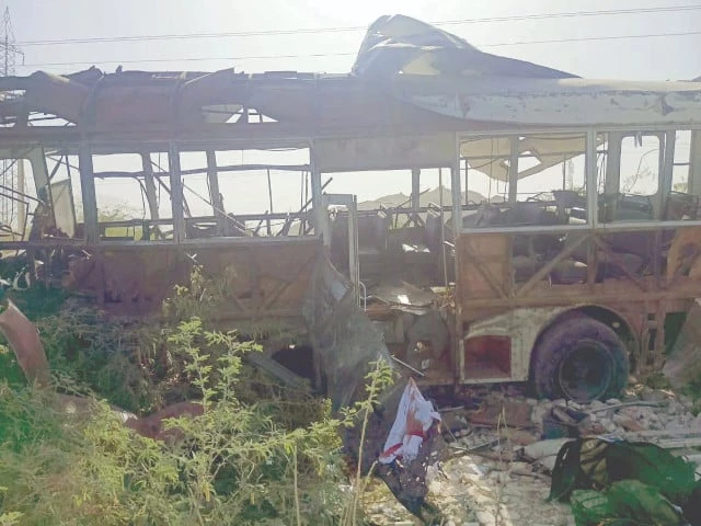 the wreckage of a school bus destroyed in bomb blast in khuzdar lies on a roadside photo ppi the wreckage of a school bus destroyed in bomb blast in khuzdar lies on a roadside photo ppi