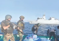 pakistan navy sailors search a suspicious drug laden dhow in the arabian sea photo inp