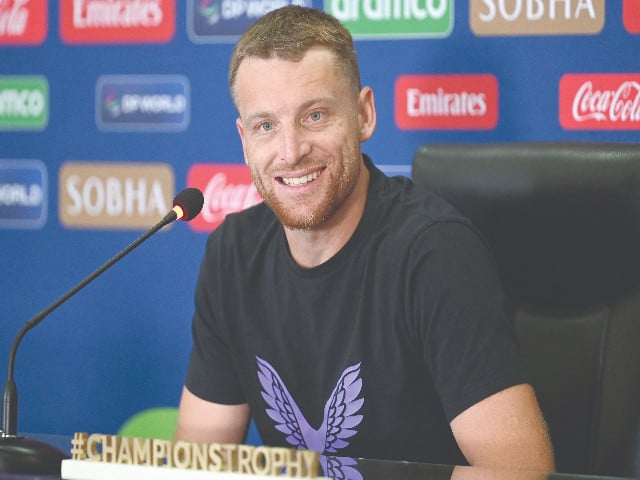 england captain jos buttler speaks in a press conference at gaddafi stadium in lahore on the eve of his team s clash against australia photo afp