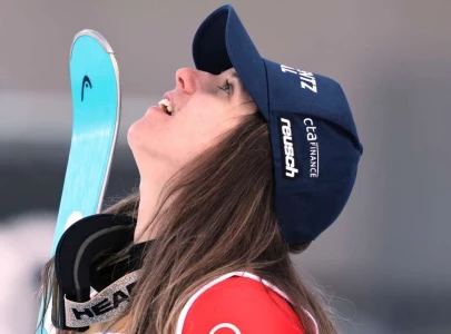 rast wins slalom gold as shiffrin misses out