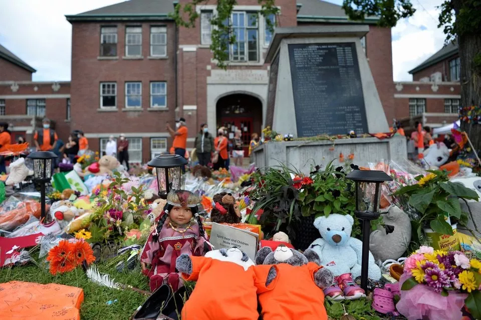 a memorial on the grounds of the former kamloops indian residential school is seen after the remains of 215 children some as young as three years old were found at the site in kamloops british columbia canada june 5 2021 reuters jennifer gauthier a memorial on the grounds of the former kamloops indian residential school is seen after the remains of 215 children some as young as three years old were found at the site in kamloops british columbia canada june 5 2021 reuters jennifer gauthier