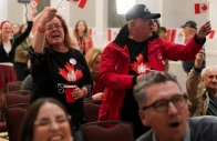 supporters of the forever canadian group who want alberta to remain in canada wave canadian flags as they watch the results of a non binding referendum on alberta sovereignty in edmonton alberta canada october 19 2026 photo reuters
