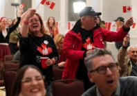 supporters of the forever canadian group who want alberta to remain in canada wave canadian flags as they watch the results of a non binding referendum on alberta sovereignty in edmonton alberta canada october 19 2026 photo reuters