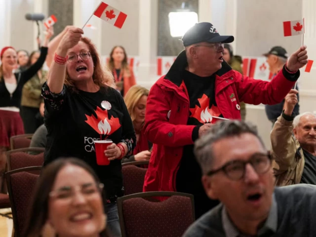 supporters of the forever canadian group who want alberta to remain in canada wave canadian flags as they watch the results of a non binding referendum on alberta sovereignty in edmonton alberta canada october 19 2026 photo reuters supporters of the forever canadian group who want alberta to remain in canada wave canadian flags as they watch the results of a non binding referendum on alberta sovereignty in edmonton alberta canada october 19 2026 photo reuters