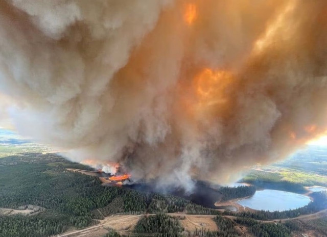 a smoke column rises from wildfire ewf031 near lodgepole alberta canada may 4 2023 alberta wildfire handout via reuters