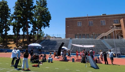 a small crew of actors and production people work in a candyjar microdrama production involving high school football and cheerleaders at a high school in los angeles california us on july 7 2026 photo reuters