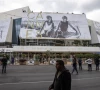 workers set up a giant canvas of the official poster featuring actors geena davis and susan sarandon from ridley scott s road movie thelma louise on the facade of the festival palace before the start of the 79th cannes film festival in cannes france may 10 2026 reuters marko djurica purchase licensing rights