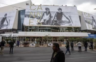 workers set up a giant canvas of the official poster featuring actors geena davis and susan sarandon from ridley scott s road movie thelma louise on the facade of the festival palace before the start of the 79th cannes film festival in cannes france may 10 2026 reuters marko djurica purchase licensing rights